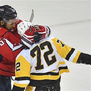 Capitals Devante Smith-Pelly roughs up Penguins Patric Hornqvist in the third period in game 2 of the second-round playoff series against the Washington Capitals, Sunday, April 29, 2018 at the Capital One Arena Washington D.C. 