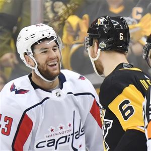 Capitals forward Tom Wilson laughs at Jamie Oleksiak during the Eastern Conference semifinals.