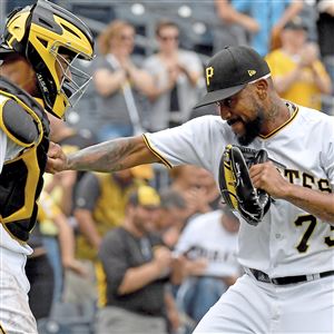 Pirates pitcher Felipe Vazquez arrives at court in handcuffs