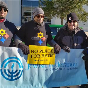 From left: Eric Manning II, Mother Emanuel AME Chuch Pastor Eric Manning, Rabbi Jonathan Perlman and Beth Kissileff.