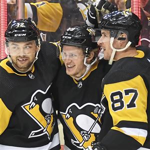Penguins trade for rights to Harvard defense prospect John Marino