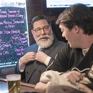 Mayor Bill Peduto enjoys a drink with Todd Miller of Swissvale after the Pittsburgh Penguins game on Thursday at Cappy's Cafe in Shadyside. In 2018, Mr. Peduto expensed Cappy’s tabs to his campaign more than once a week, on average, totalling $3,169.44 in campaign expenditures.