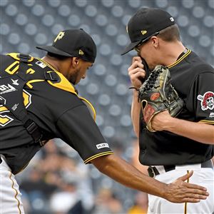 VIDEO: Call overturned when Pirates catcher Russell Martin blocks
