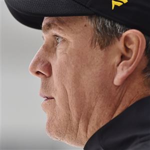 Penguins coach Mike Sullivan watches the team practice Friday, Sept. 20, 2019 at UPMC Lemieux Sports Complex in Cranberry.