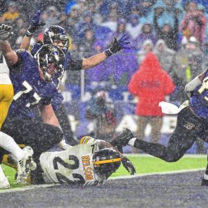 Ravens running back Justice Hill scores a touchdown against the Steelers in the second quarter, Sunday, Dec. 29, 2019, at M&T Bank Stadium.