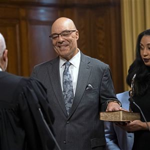 Pittsburgh City Councilman Ricky Burgess  is sworn in Monday, Jan. 6, 2020, by Judge Joseph Williams at the City Council Chambers, Downtown.