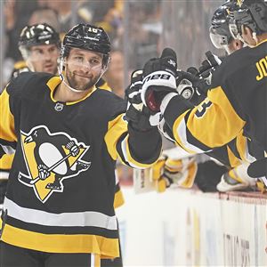 Penguins left wing Jason Zucker celebrates his first goal of the night against the Canadiens on Friday, Feb. 14, 2020, at PPG Paints Arena. 