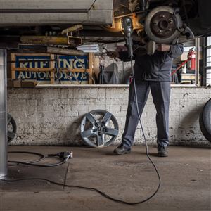 Mechanic Mike Rust works on a vehicle's rotors on Wednesday, March 25, 2020, at Ruffing Automotive in Dormont. 