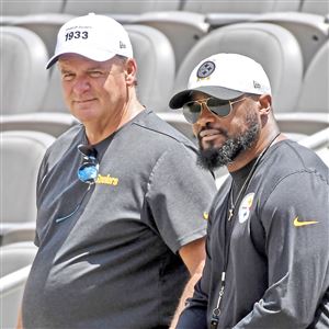 Steelers vice-president and general manager Kevin Colbert stands beside head coach Mike Tomlin during minicamp Tuesday, June 15, 2021, at Heinz Field.