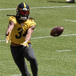 In name of safety, Steelers debut astronaut-like helmet protective  coverings at minicamp