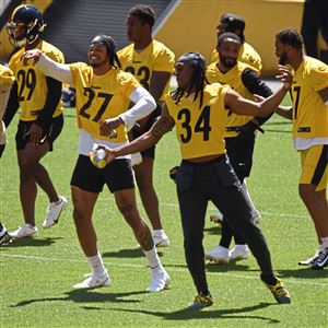 Pittsburgh Steelers guard David DeCastro (66) signs autographs for fans on  his way to the practice fields during practice at NFL football training  camp in Latrobe, Pa., Sunday, July 30, 2017 . (