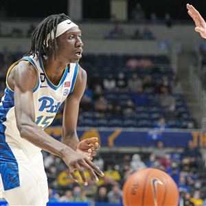 Pitt’s Mouhamadou Gueye passes the ball against Notre Dame on Tuesday, Dec. 28, 2021, at Petersen Events Center in Oakland.  