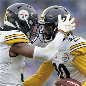 Derek Watt of the Pittsburgh Steelers celebrates a touchdown with