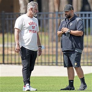 Pirates manager Derek Shelton talks to pitching coach Oscar Marin during minor league spring training, Friday, Feb. 25, 2022, in Bradenton. (Matt Freed/Post-Gazette)
