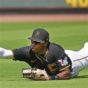 Pittsburgh Pirates' Oneil Cruz waits his turn in the batting cage