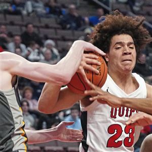 Aliquippa’s Cameron Lindsey battles Devon Prep’s Lucas Orchard for the ball in the PIAA 3A boys basketball championship on Saturday, March 26, 2022, at Giant Center in Hershey, Pa. Aliquippa lost 76-58. 