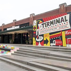 People in front of a store on Penn Avenue in the Strip District