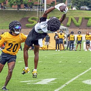 Pittsburgh Steelers linebacker Chapelle Russell (49) makes his way to the  practice fields for the NFL football team's training camp workout in  Latrobe, Pa., Thursday, July 27, 2023. (AP Photo/Gene J. Puskar