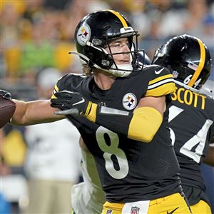 Pittsburgh Steelers quarterback Kenny Pickett rolls out against the Tampa  Bay Buccaneers during an NFL football game at Acrisure Stadium, Sunday,  Oct. 16, 2022 in Pittsburgh. (Winslow Townson/AP Images for Panini Stock