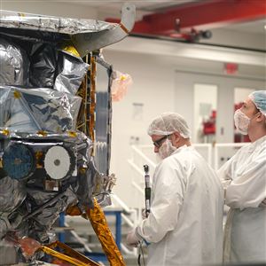 Astrobotic Technology staff make adjustments and check the weight of their Peregrine Lander lunar landing vehicle at the robotics company headquarters on the North Side Thursday, August 31, 2023. The lunar landing vehicle is set to take off from Cape Canaveral Jan. 8 and land on the moon Feb. 23.  