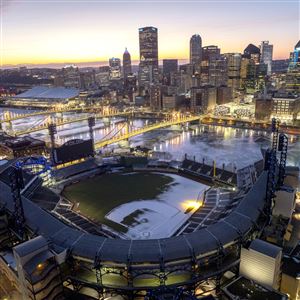 The Three Sisters’ bridges are suspended over the Allegheny River as the sun rises over Downtown and PNC Park on Wednesday, Jan. 29, 2025.