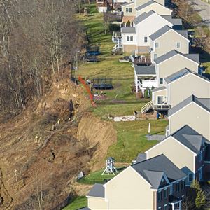 A landslide in the Sonoma Ridge development at Stags Leap Lane in Moon Township has caused yards to collapse and has closed a portion of Beaver Grade Road. Crews are working to stabilize the hillside and reopen the road on Wednesday, Jan. 31, 2024. 