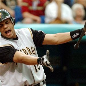 Pittsburgh Pirates' Josh Harrison (5) loses his helmet as he runs