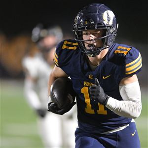 Central Catholic (11) Bradley Gompers scores a touchdown against North Allegheny in a WPIAL Class 6A football championship game at Norwin High School on Saturday, Nov. 15, 2024.