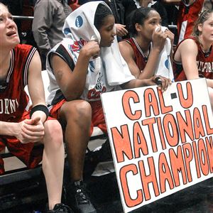 California University of Pennsylvania's Megan Storck, left, cries after her team won the NCAA Division II championship game against Drury in 2004, in St. Joseph, Mo. Storck was named the most outstanding player of the tournament and cemented a place in her school's sports history.