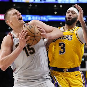 Lakers' Quest for Gold Ends, Nuggets Prevail