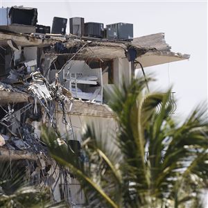 A general view of the partially collapsed 12-story Champlain Towers South condo building on July 03, 2021 in Surfside, Florida. Over one hundred people are being reported as missing as the search-and-rescue effort continues. 