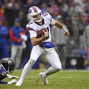 Buffalo Bills' Tre'Davious White sneaks a peak at Baltimore Ravens