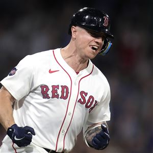 Boston Red Sox's Tyler O'Neill celebrates while rounding the bases on his two-run home run in the eighth inning of a baseball game against the Toronto Blue Jays at Fenway Park, Wednesday, Aug. 28, 2024, in Boston.