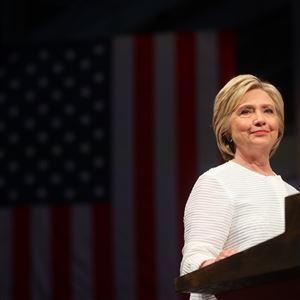 Hillary Clinton addresses supporters at the Brooklyn Navy Yard on Tuesday night in New York. She hailed it as “the first time in our nation’s history that a woman will be a major party’s nominee.”