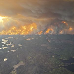 This photo provided by the Manitoba government shows wildfires in Flin Flon, Manitoba, Canada on Tuesday, May 27, 2025.