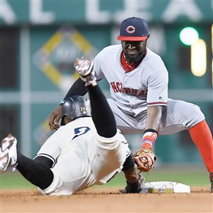 The Pirates' Gregory Polanco is tagged out at second base by the Reds' Brandon Phillips during the second inning Friday at PNC Park.