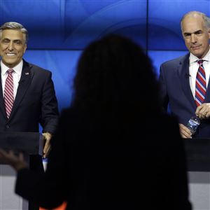 U.S. Sen.Bob Casey, D-Pa., right, and Republican challenger U.S. Rep. Lou Barletta prepare before their first debate, Saturday Oct. 20, 2018, in the studio of WPVI-TV in Philadelphia