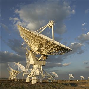 This file photo taken in 2005 shows the sun setting over the Very Large Array, one of the world's premier astronomical radio observatories, on the Plains of San Agustin, 50 miles west of Socorro, N.M.
