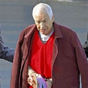 Former Penn State University assistant football coach Jerry Sandusky, center, leaves the Centre County Courthouse after attending a post-sentence motion hearing Thursday in Bellefonte, Pa.
 
 