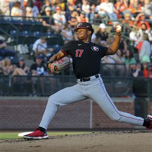 Georgia's Jaden Woods (17) delivers a pitch during an NCAA baseball game against Auburn on Friday, March 24, 2023, in Auburn, Ala.