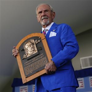Baseball Hall of Fame inductee Jim Leyland holds his plaque at the National Baseball Hall of Fame induction ceremony, on Sunday, July 21, 2024, in Cooperstown, N.Y.