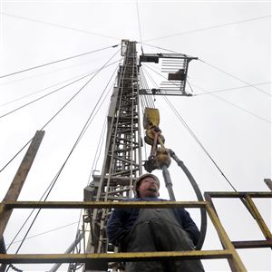 Michael Henninger/Post-Gazette 02/17/2011 Harold Westfall of Barber County, West Virginia, looks out over the site of a Rice Energy Marcellus shale drilling rig in Lone Pine, Washington County, on Jan. 19, 2011.   Photo by Michael Henninger/Post-Gazette        Original Filename: MH_shaledrilling_07.jpg   Original Filename: shalerefer0828.jpg   Original Filename: LEFT055.jpg   Original Filename: rig2.jpg