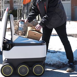 Pitt is hoping to formally debut food delivery robots this fall. Above, a Starship robot is used on the Purdue University campus. 