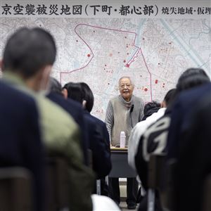 Shizuyo Takeuchi, 94-year-old Tokyo raid survivor, shares her experience in front of a map of the areas damaged during the 1945 Tokyo Firebombing at the Center of the Tokyo Raids and War Damage on Feb. 24, 2025, in Tokyo.