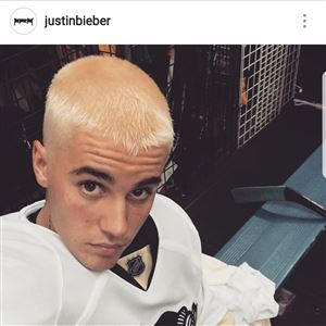 Justin Bieber takes selfie in Penguins jersey, possibly curses