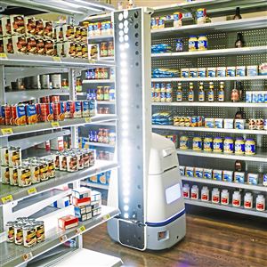 A robot made by Bossa Nova Robotics checks inventory in a mockup Wal-Mart aisle at the company's test lab on Friday, November 3, 2017 in the Strip District.