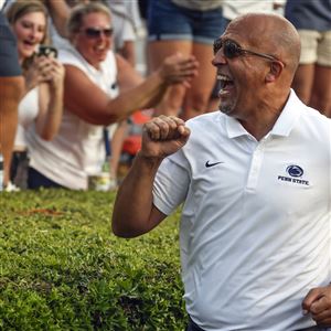 WATCH: Eli Manning presents Penn State walk-on Barney Amor a full