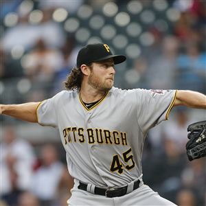 Pittsburgh Pirates manager Clint Hurdle shows the All-Star jersey for  starting pitcher Gerrit Cole after he accepted it for Col before a baseball  game against the St. Louis Cardinals, Sunday, July 12