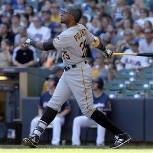 Gregory Polanco watches his solo home run fly out to right field in the fourth inning Sunday in Milwaukee.