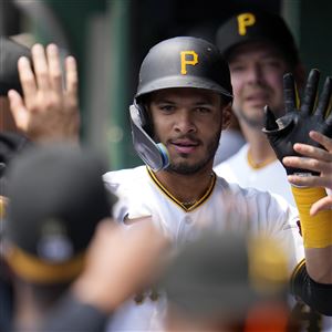 Marcano's first slam, Ortiz's first win power Pirates past Rangers